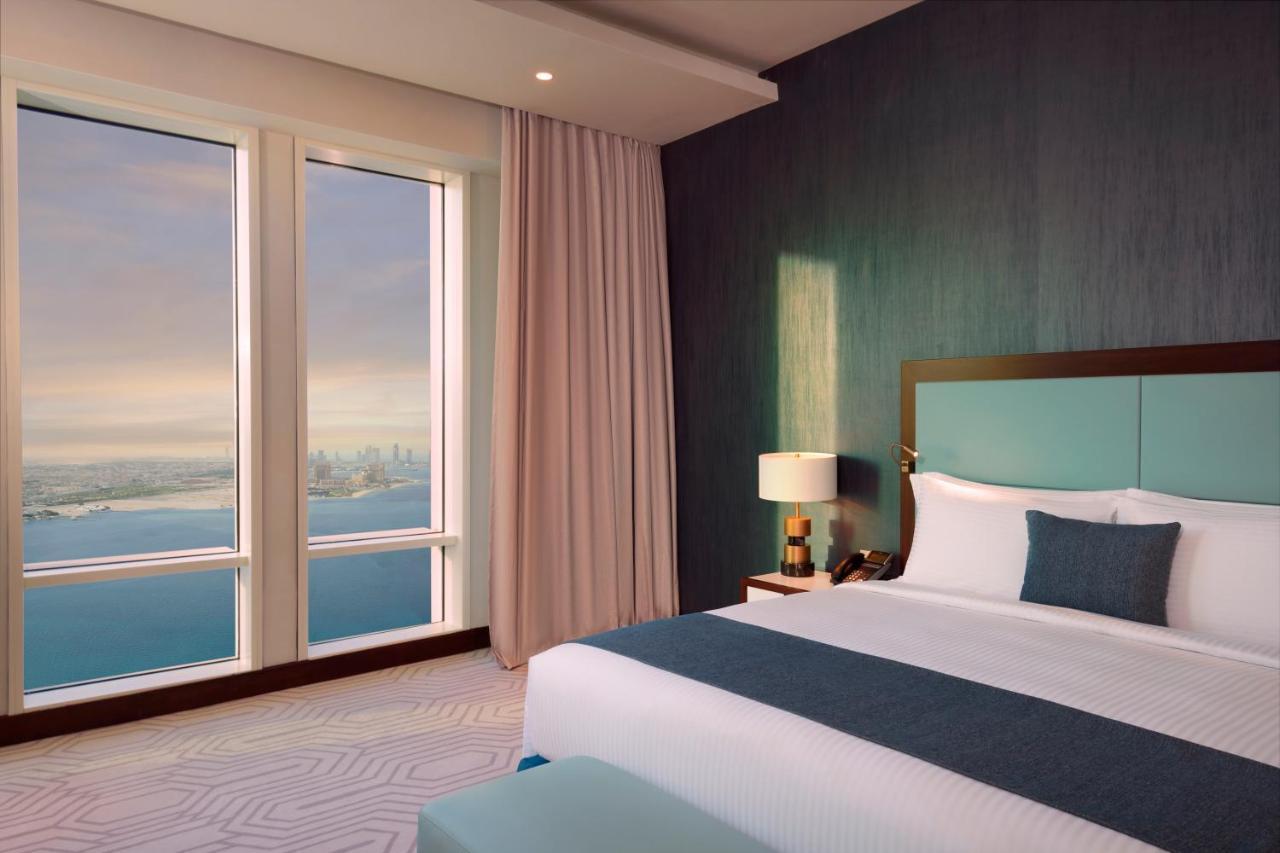 Wyndham Grand Doha West Bay Beach Exterior photo A bedroom at the Address Downtown Dubai