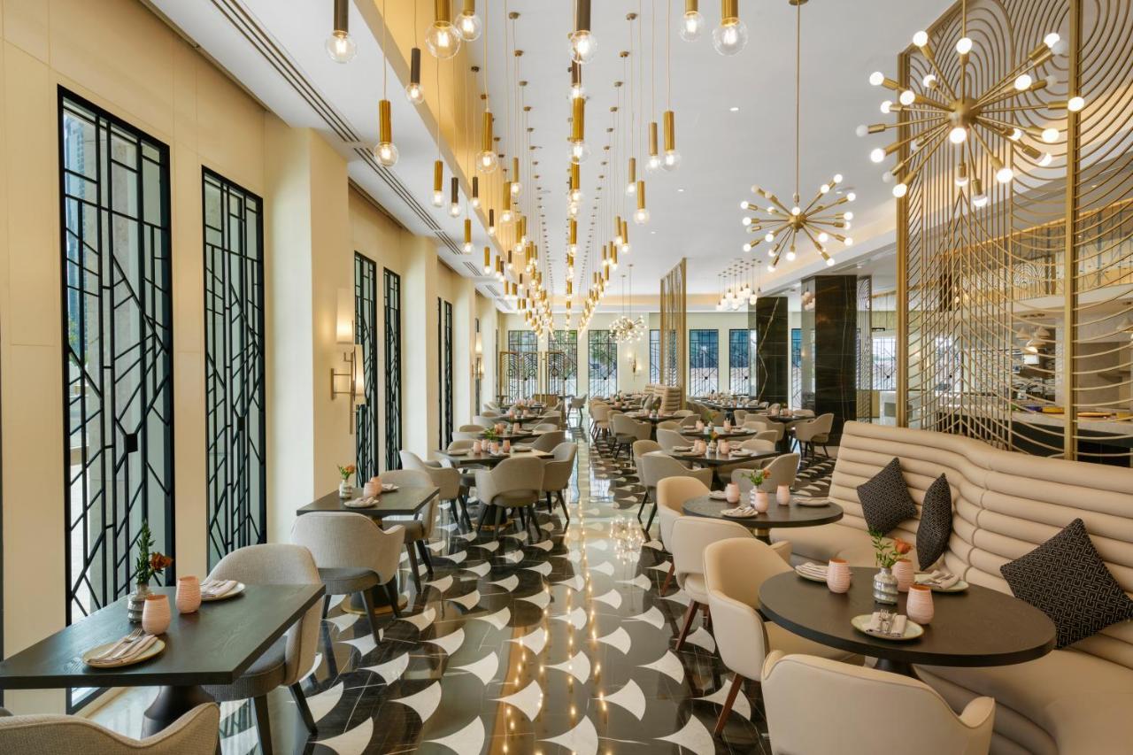 Wyndham Grand Doha West Bay Beach Exterior photo The restaurant