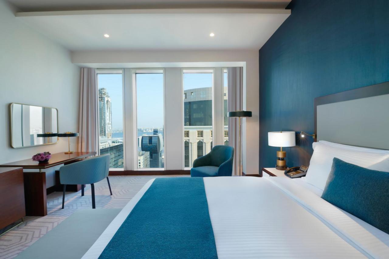 Wyndham Grand Doha West Bay Beach Exterior photo A guest room at the hotel