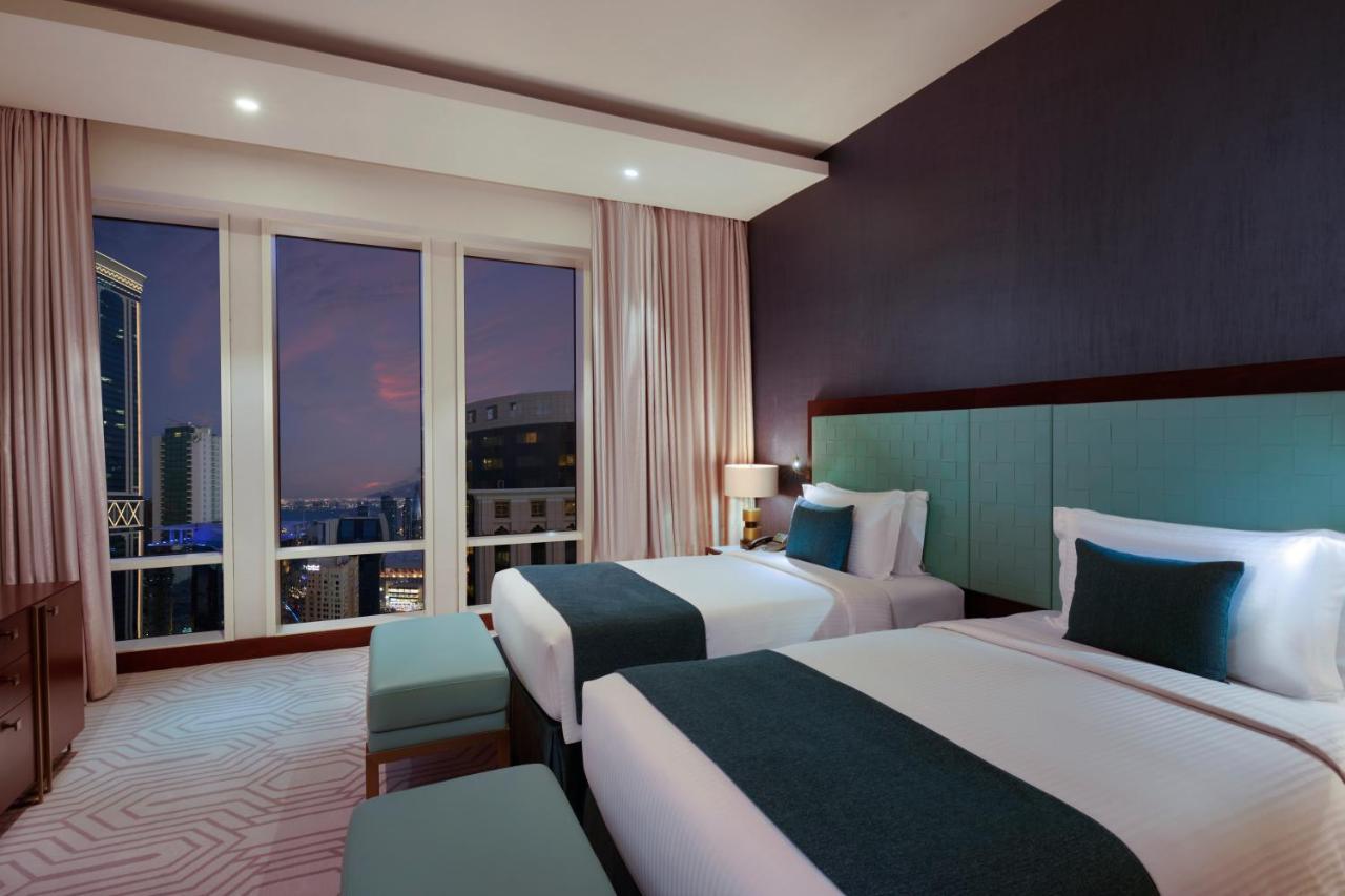 Wyndham Grand Doha West Bay Beach Exterior photo Deluxe Room