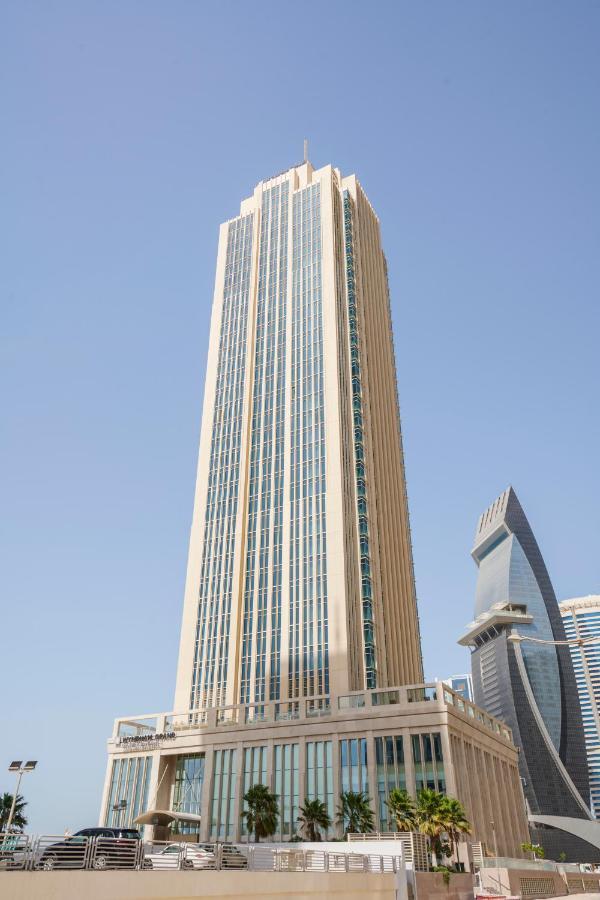 Wyndham Grand Doha West Bay Beach Exterior photo The tower in 2011