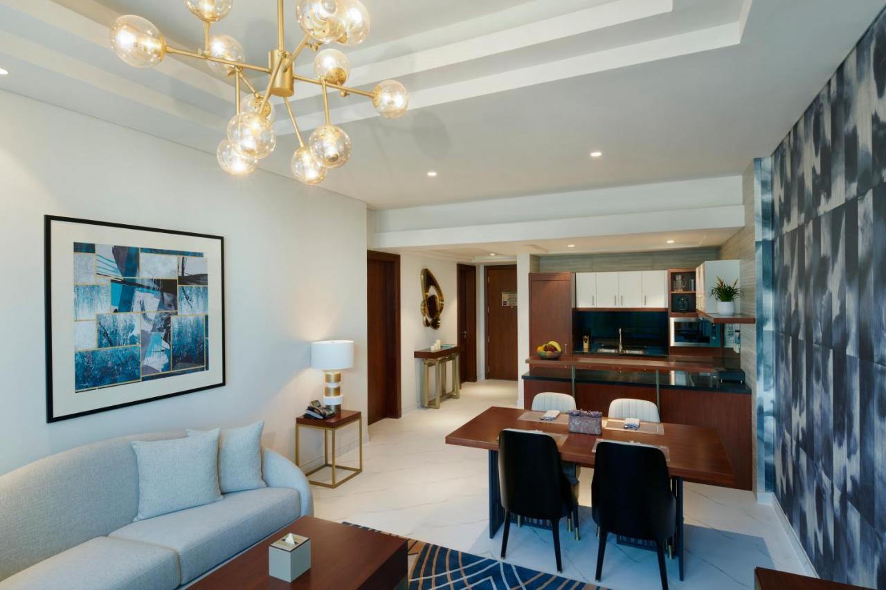 Wyndham Grand Doha West Bay Beach Exterior photo A typical apartment interior