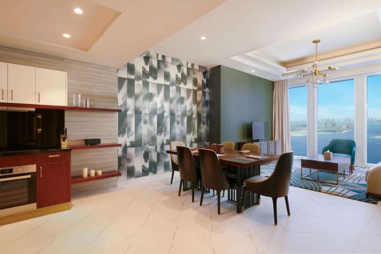 Wyndham Grand Doha West Bay Beach Exterior photo A typical apartment interior
