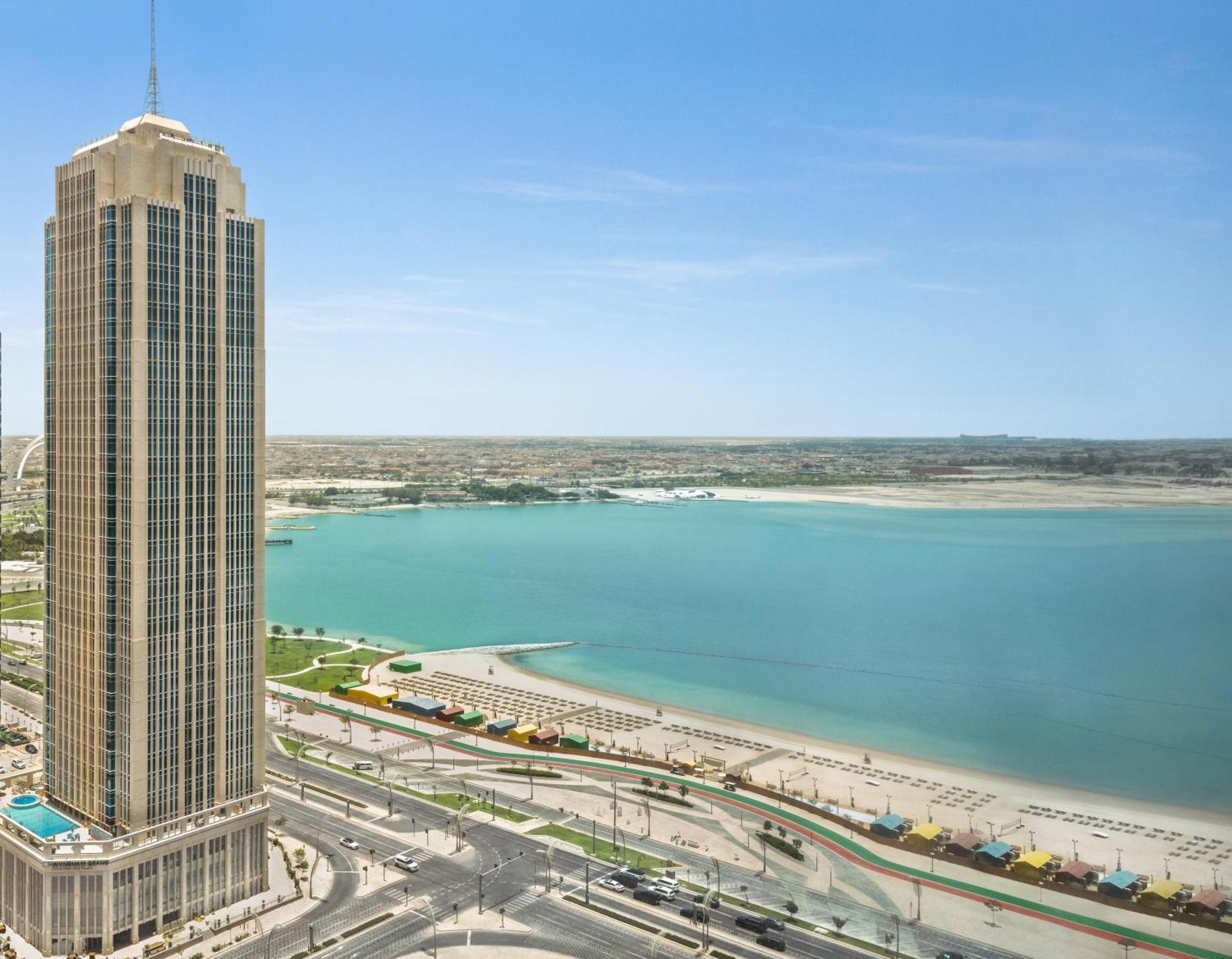 Wyndham Grand Doha West Bay Beach Exterior photo The Gulf Palace Hotel