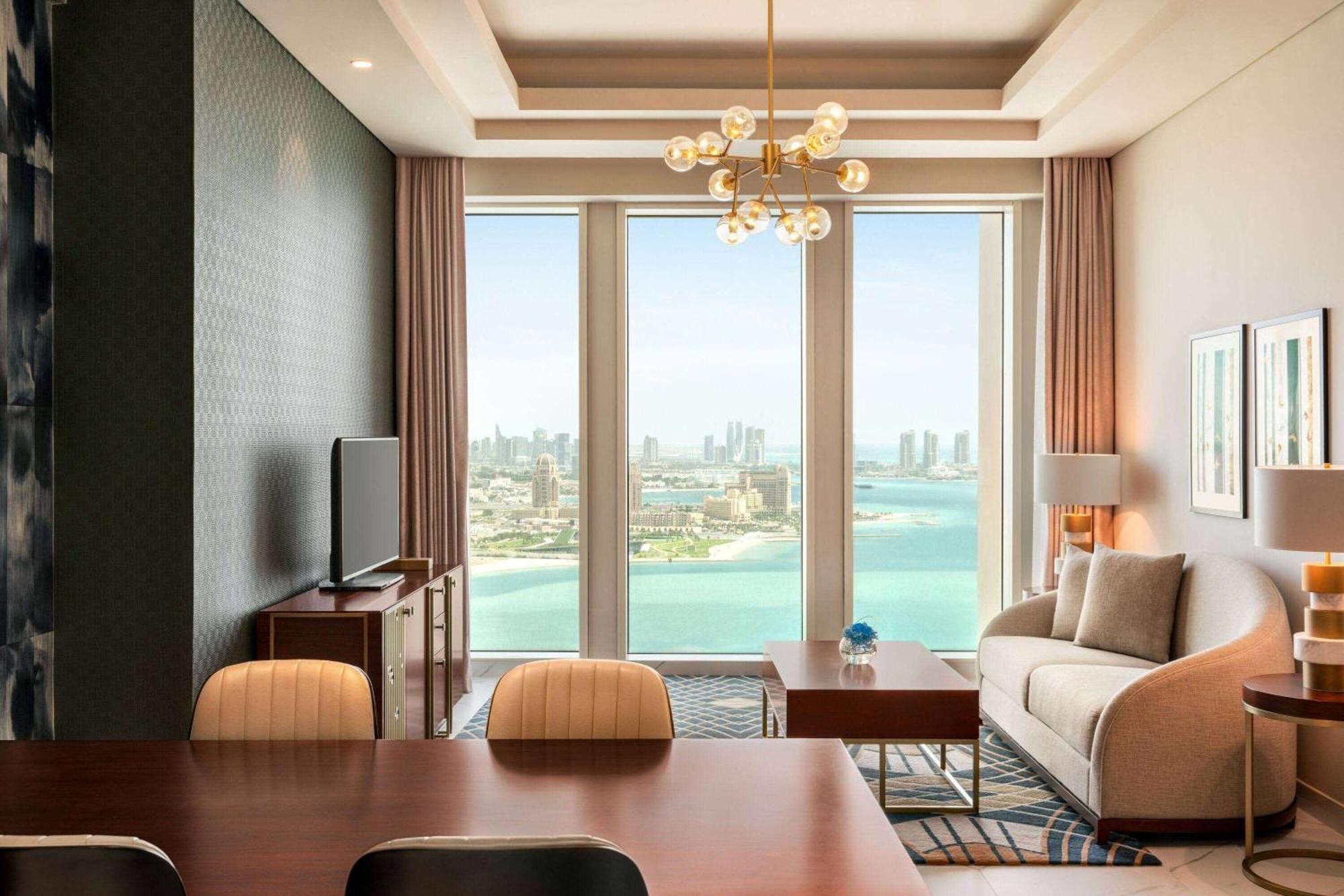Wyndham Grand Doha West Bay Beach Exterior photo A living room at the hotel