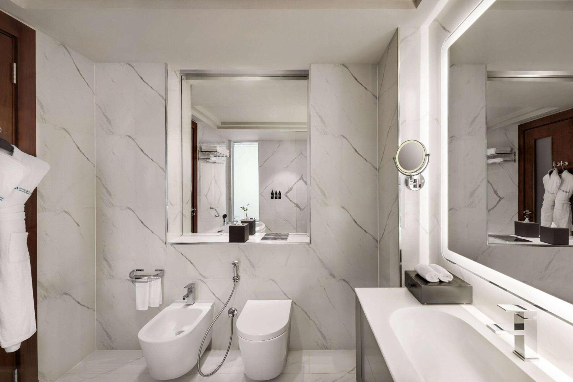 Wyndham Grand Doha West Bay Beach Exterior photo Bathroom